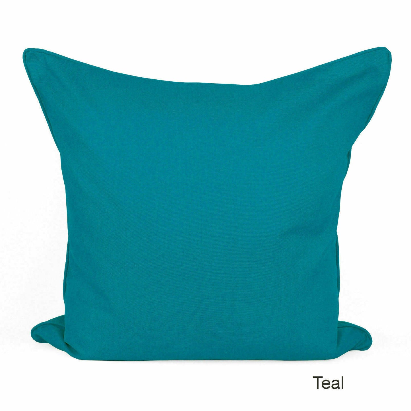 a teal colored pillow on a white background