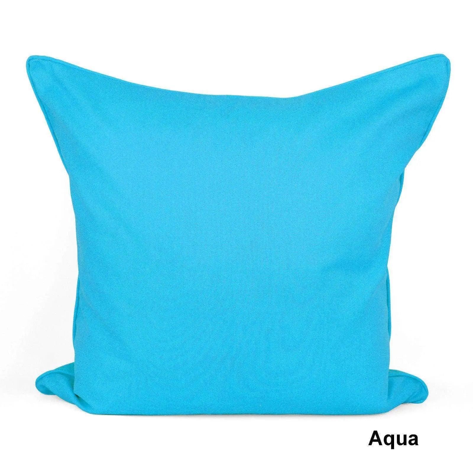 a blue pillow sitting on top of a white floor