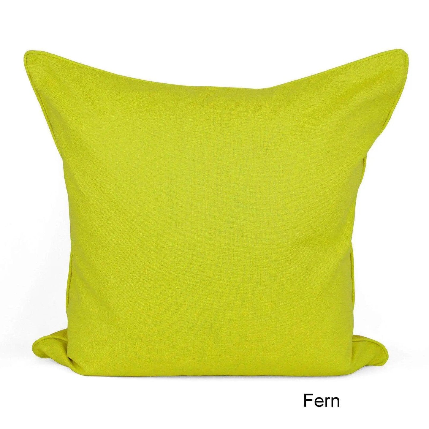 a lime green pillow on a white background