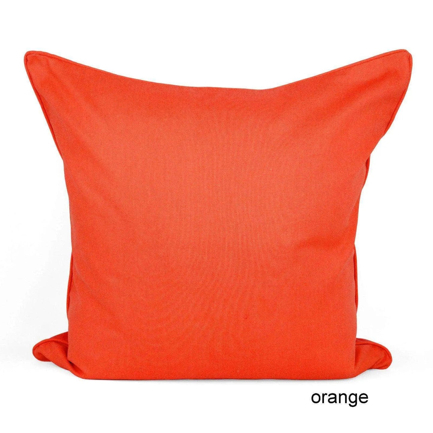 an orange pillow on a white background
